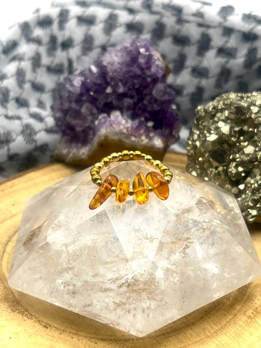 Genuine Amber with Gold Vermeil. One of a kind Stretch ring available in 3 sizes.