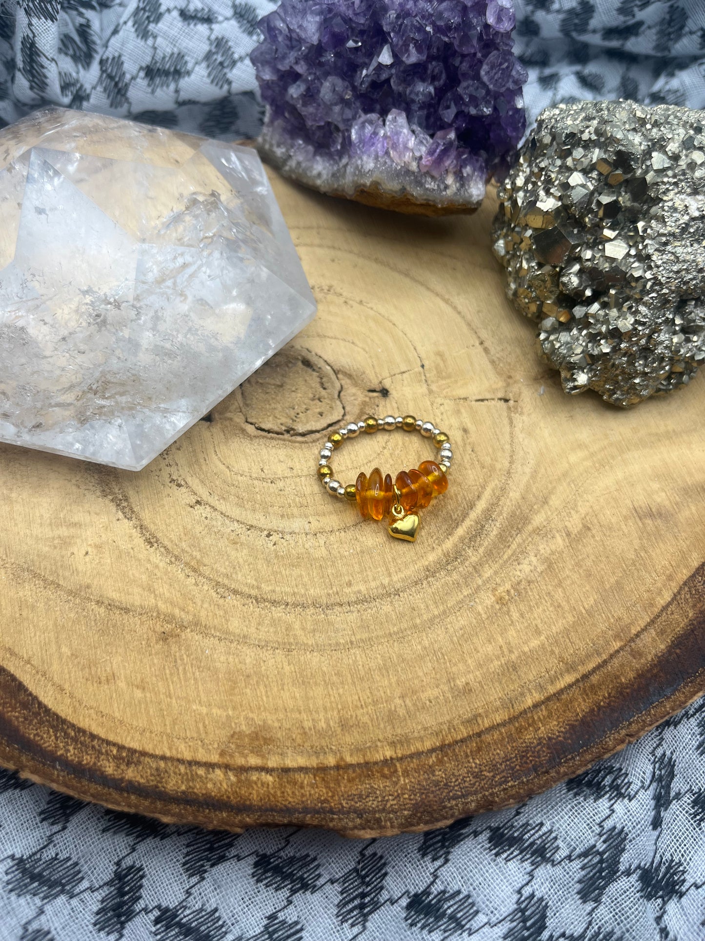 Genuine Amber with Gold Vermeil and Sterling silver. One of a kind Stretch ring available in 3 sizes.