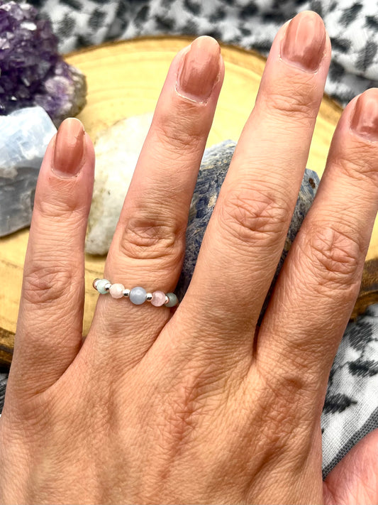 Angelite, Kunzite and Amazonite. Sterling silver stretch ring.