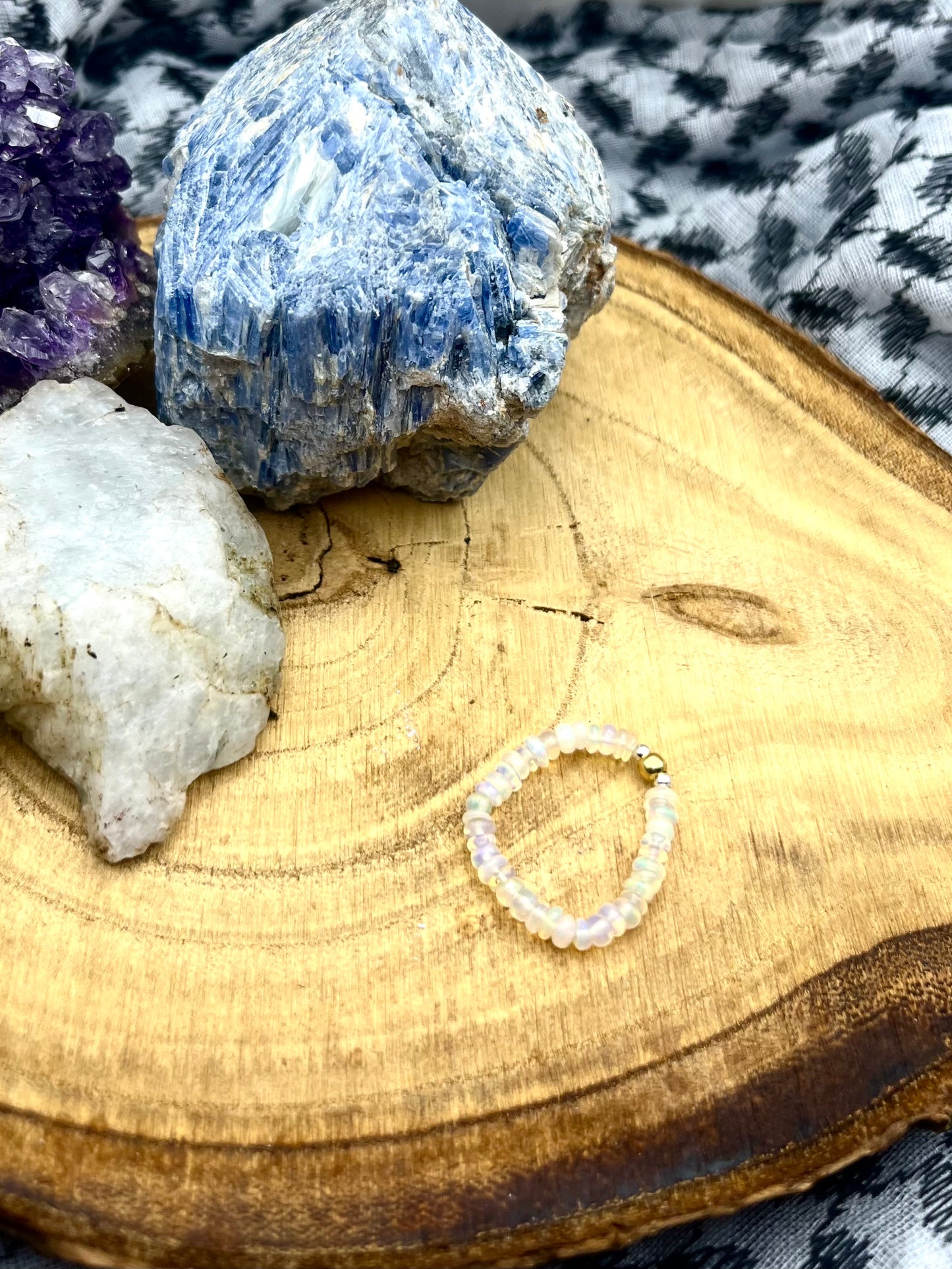 Opal and Sterling silver / gold plated stretch ring.