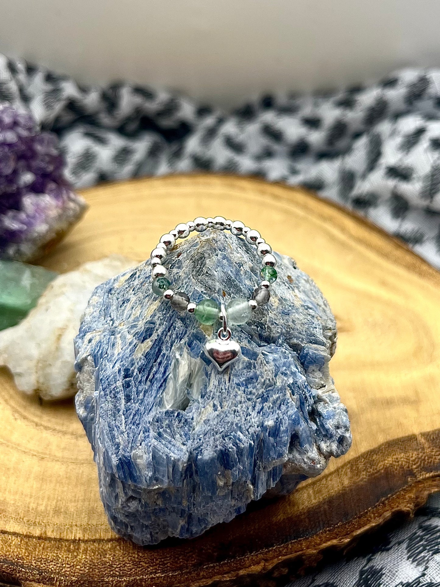 Fluorite, Smoky Quartz, Moss Agate. Sterling silver stretch ring with heart charm.