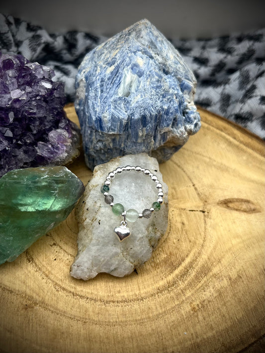 Fluorite, Smoky Quartz, Moss Agate. Sterling silver stretch ring with heart charm.