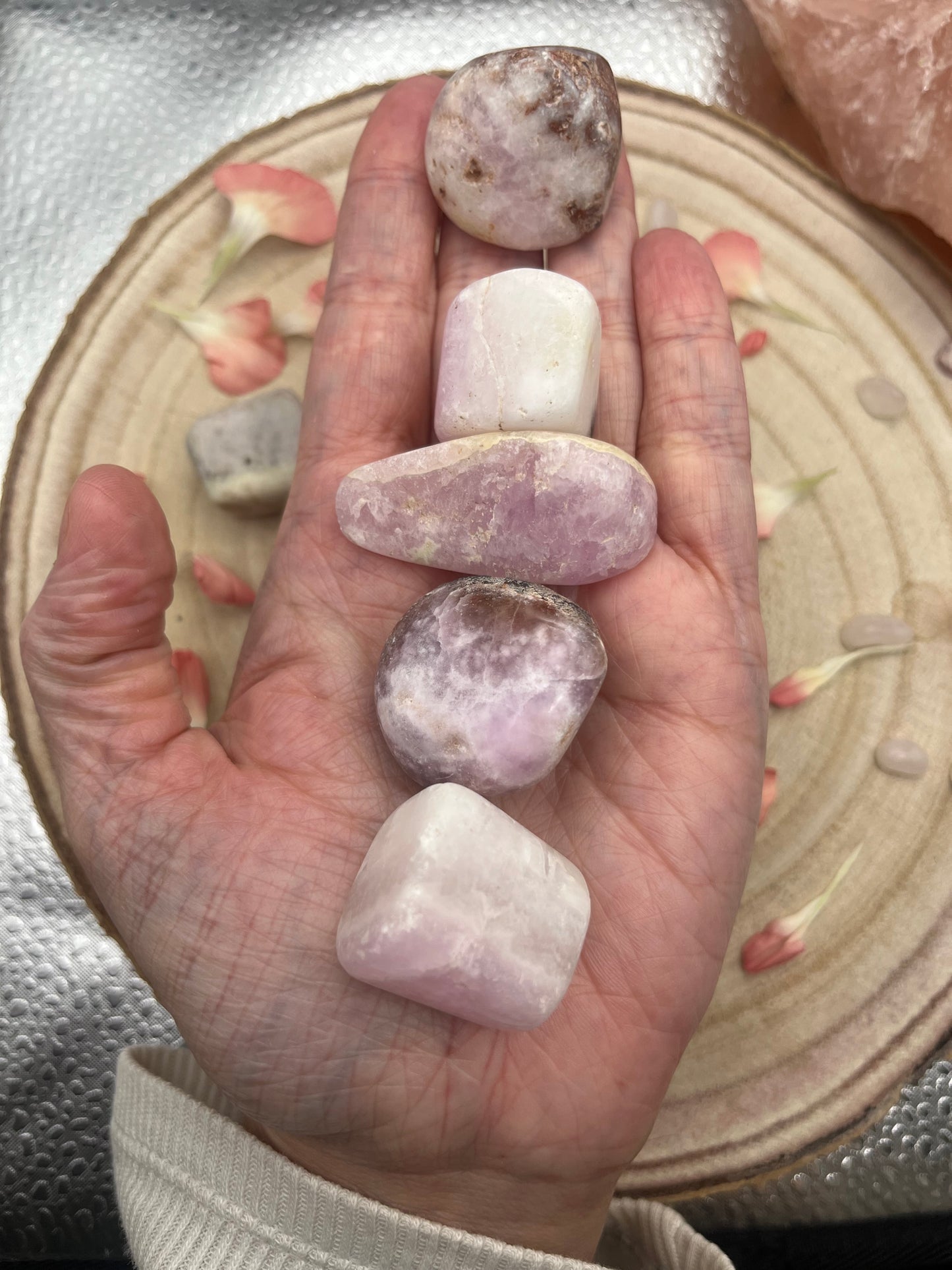 Rare pink aragonite tumblestones. With brown aragonite and white calcite.