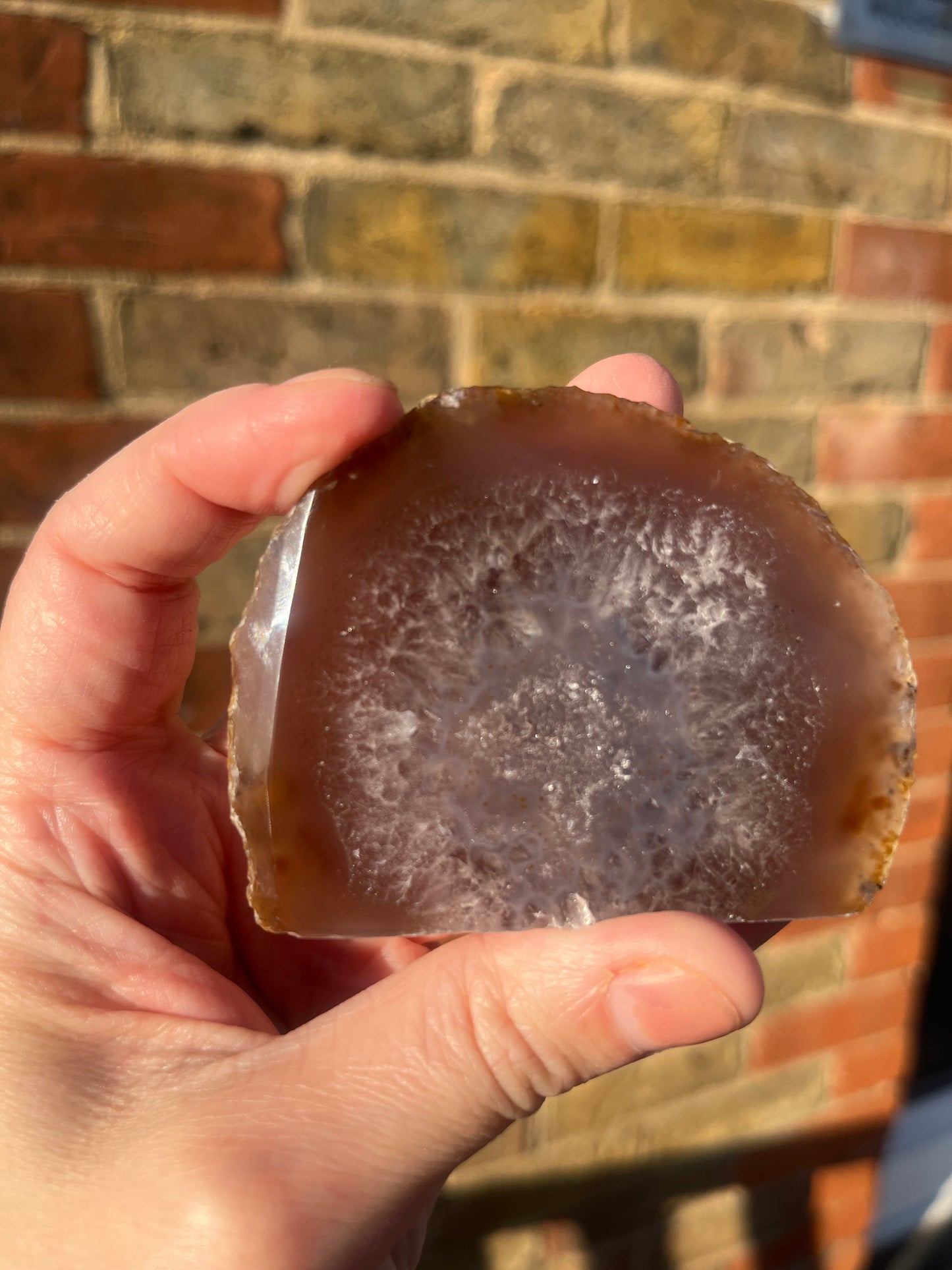 Smaller natural stand up geode 3 with polished front. 5 cm tall.
