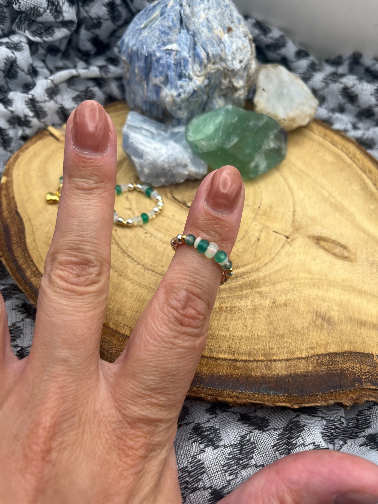 Green onyx, Opal and Moss Agate with gold plated silver and sterling silver. Stretchy Ring available in small, medium and large.