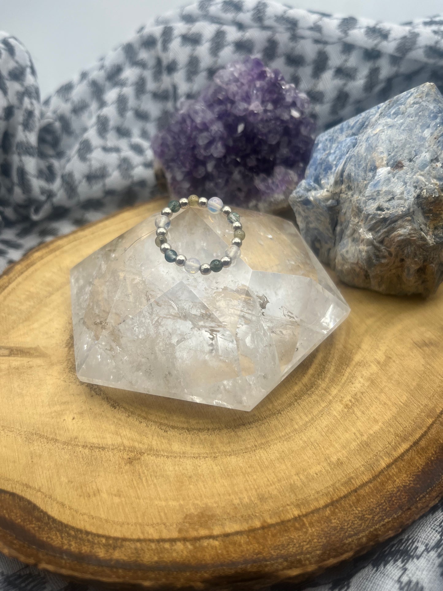 Opalite and Moss Agate with sterling silver. Stretchy Ring available in small, medium and large.