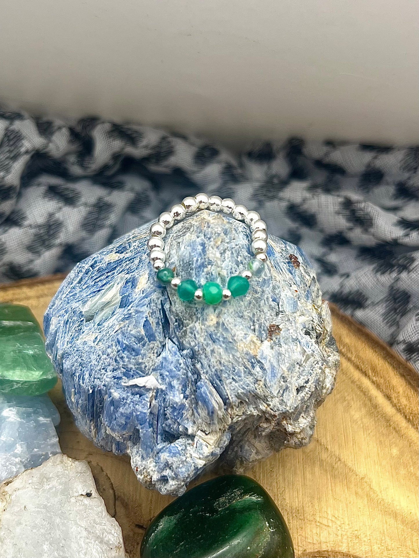 Green onyx, Chrysoprase and Moss Agate with gold plated silver and sterling silver. Stretchy Ring available in small, medium and large.