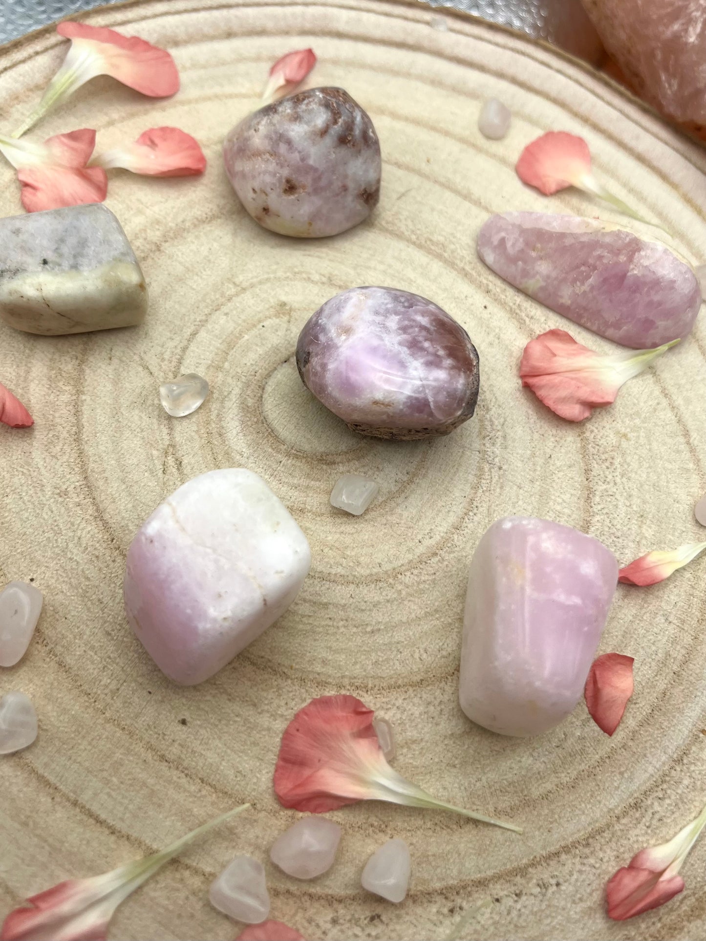 Rare pink aragonite tumblestones. With brown aragonite and white calcite.