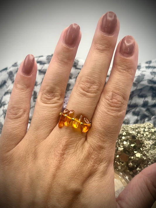 Genuine Amber with Gold Vermeil. One of a kind Stretch ring available in 3 sizes.