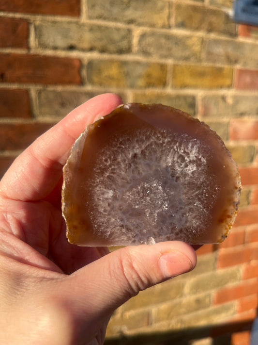 Smaller natural stand up geode 3 with polished front. 5 cm tall.