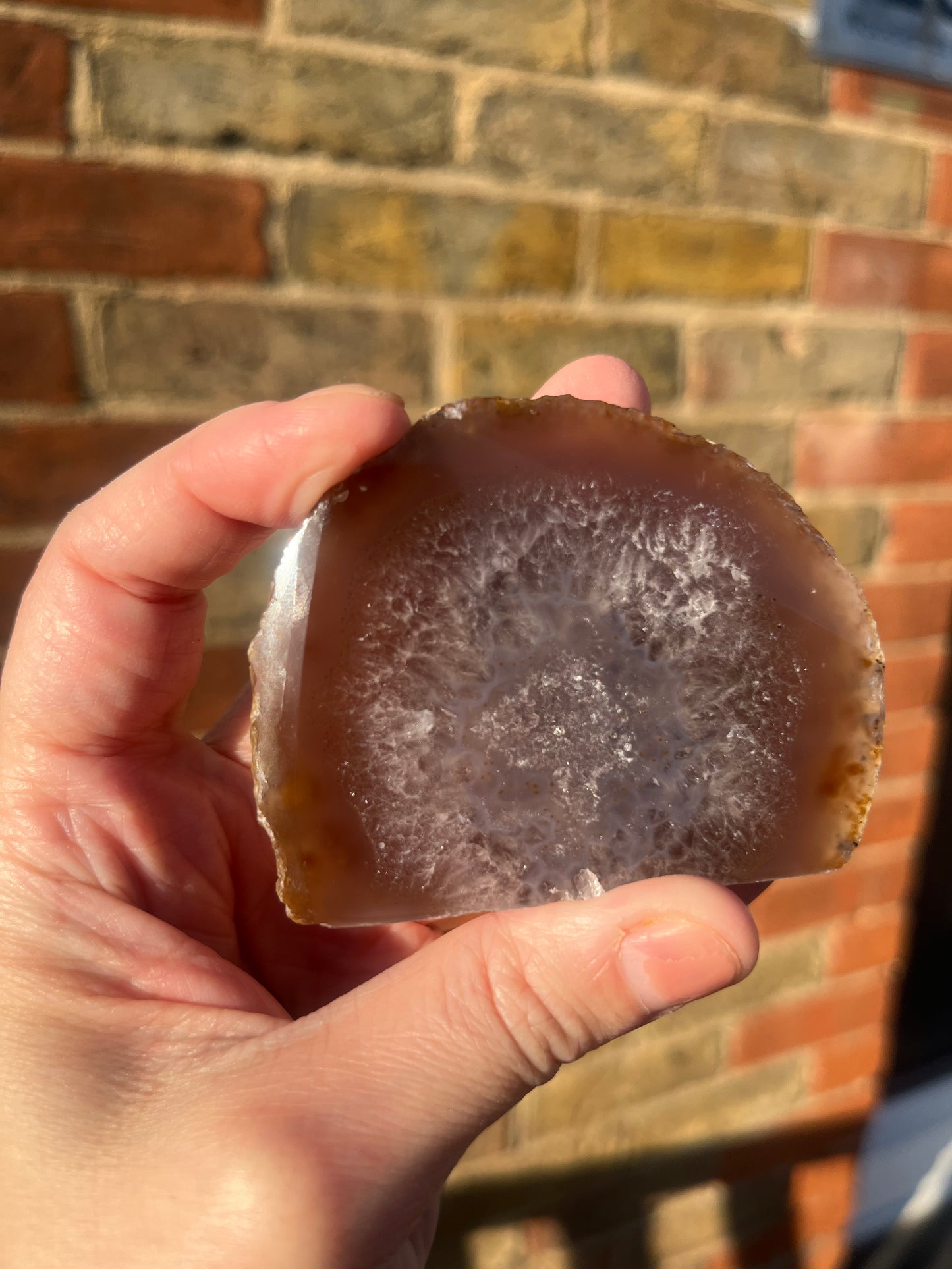 Smaller natural stand up geode 3 with polished front. 5 cm tall.