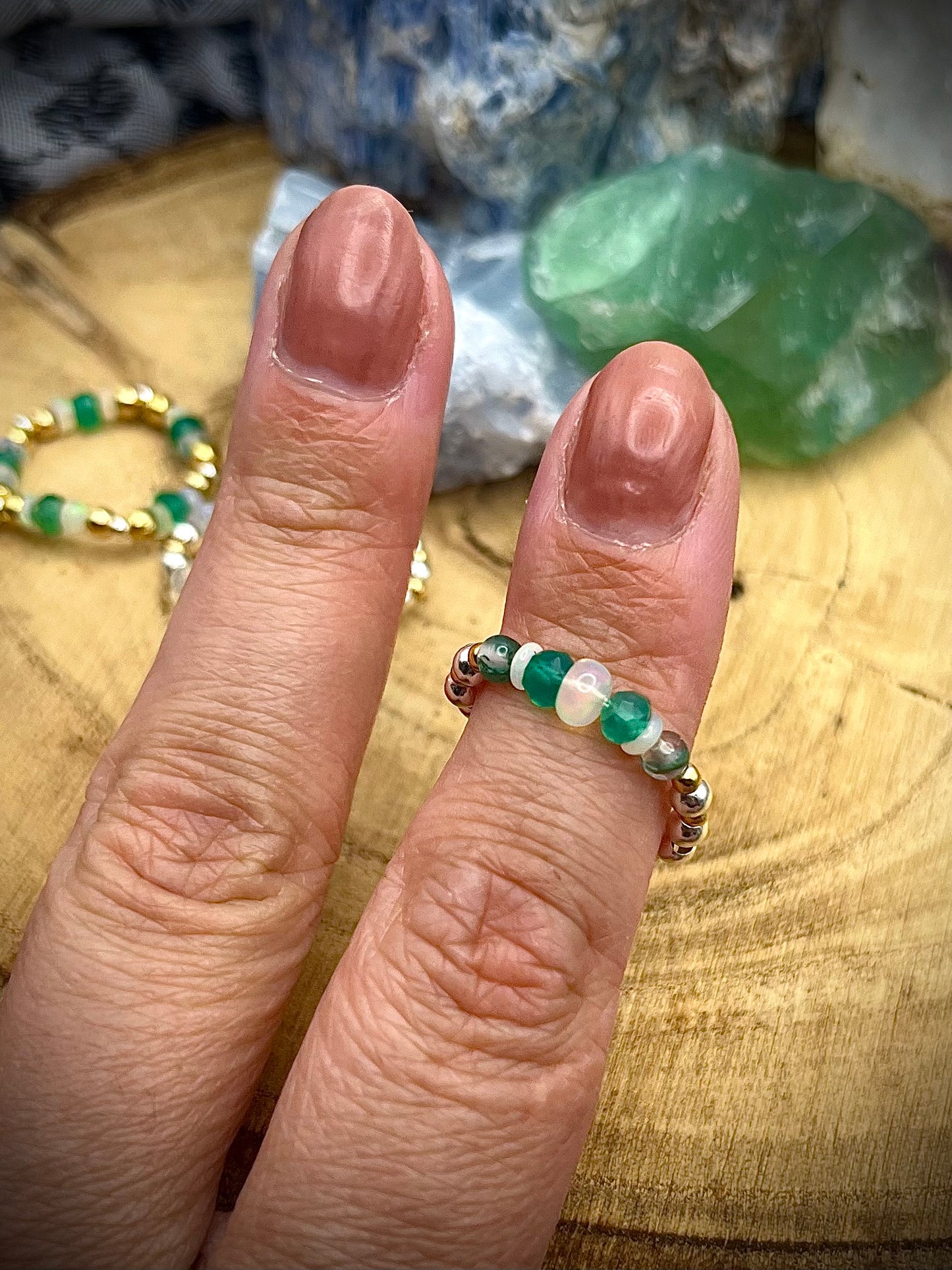 Green onyx, Opal and Moss Agate with gold plated silver and sterling silver. Stretchy Ring available in small, medium and large.
