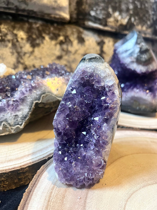 A grade Amethyst cut base. Polished edges.