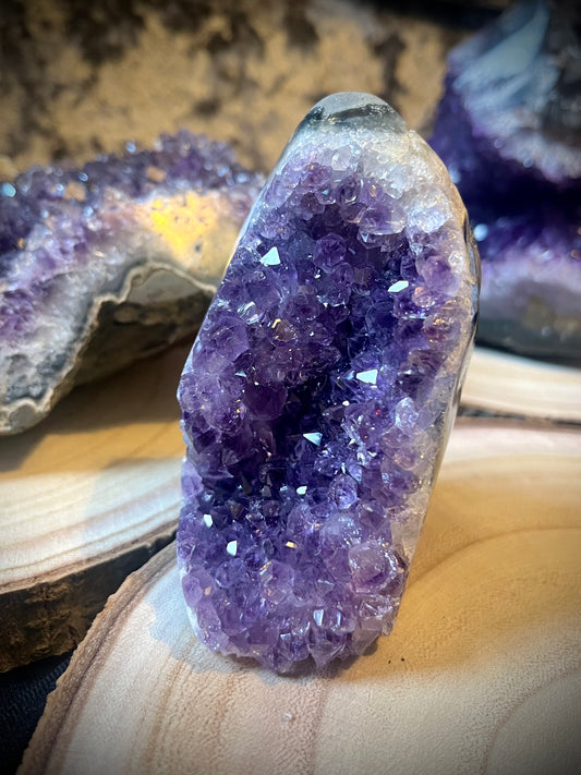 A grade Amethyst cut base. Polished edges.