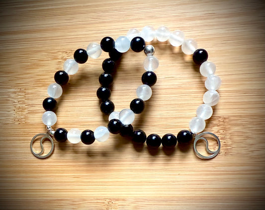 Handmade Yin Yang ☯️ stretch bracelet. 8mm Satin Spar and Tourmaline beads with sterling silver.