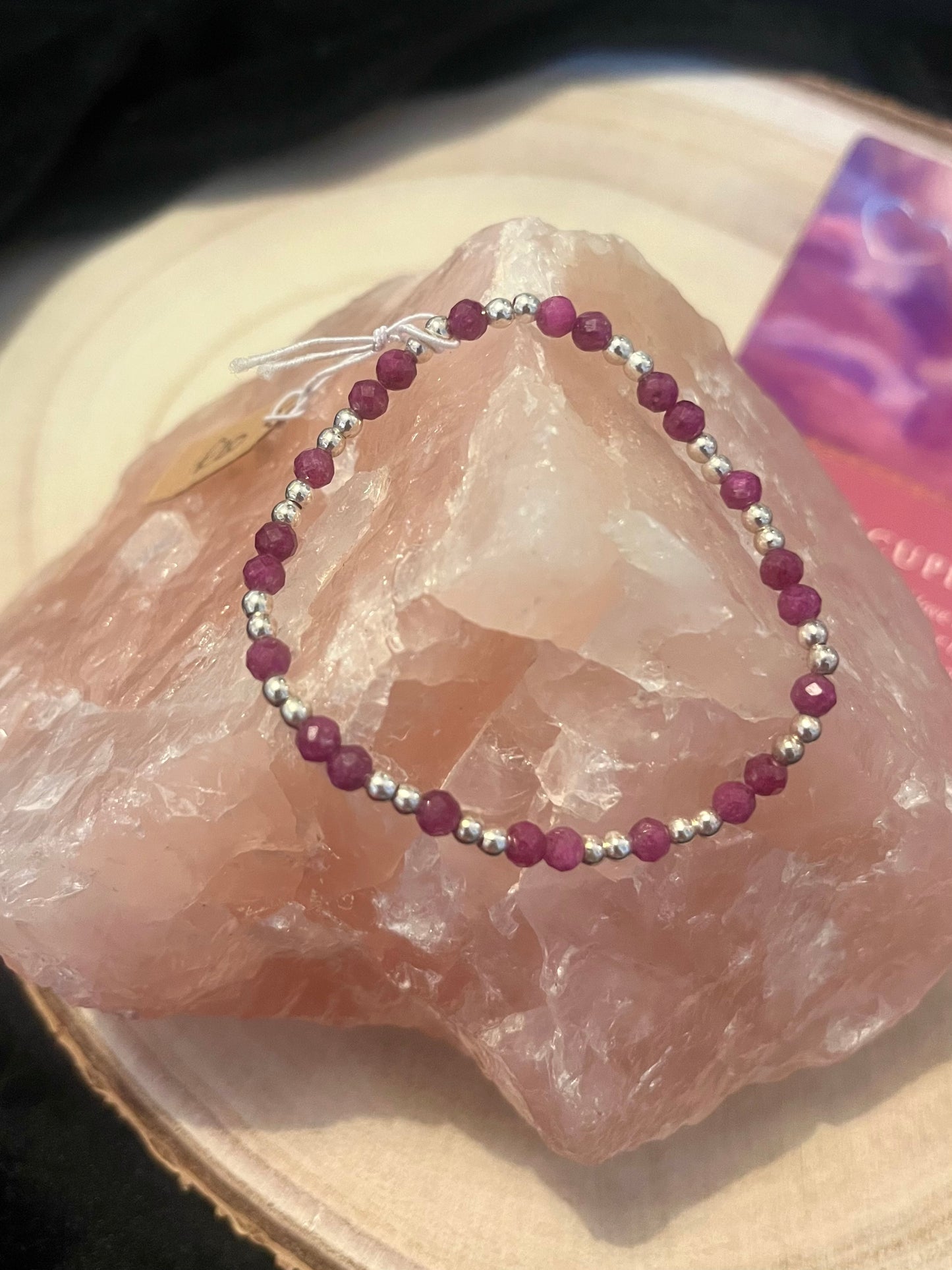 Faceted Ruby and sterling silver stretch bracelet size small.