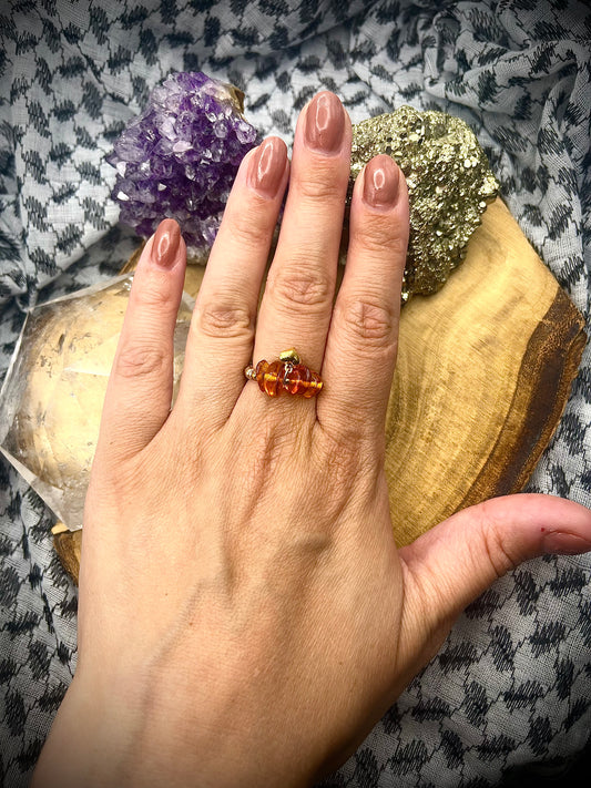 Genuine Amber with Gold Vermeil and Sterling silver. One of a kind Stretch ring available in 3 sizes.