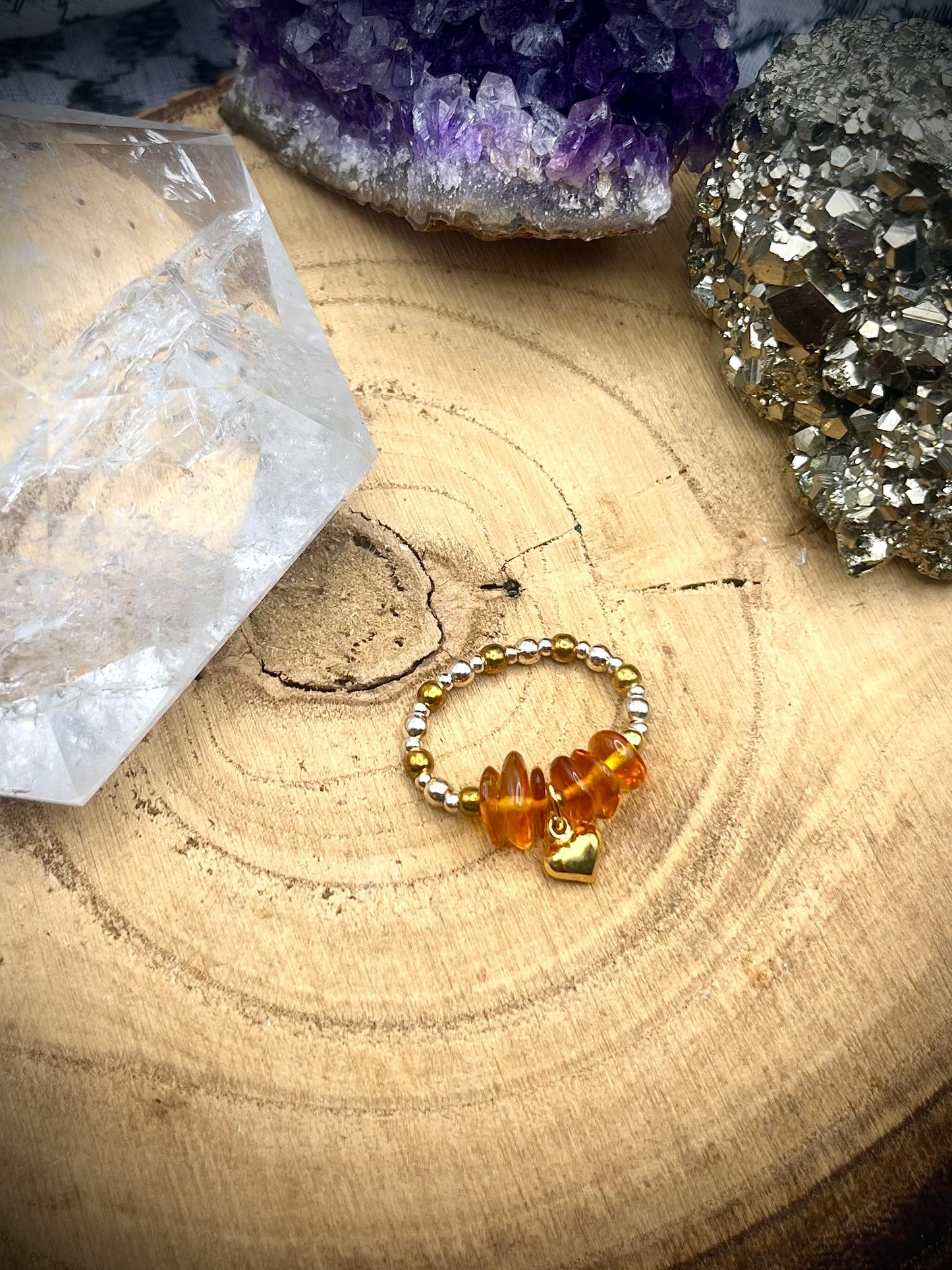 Genuine Amber with Gold Vermeil and Sterling silver. One of a kind Stretch ring available in 3 sizes.