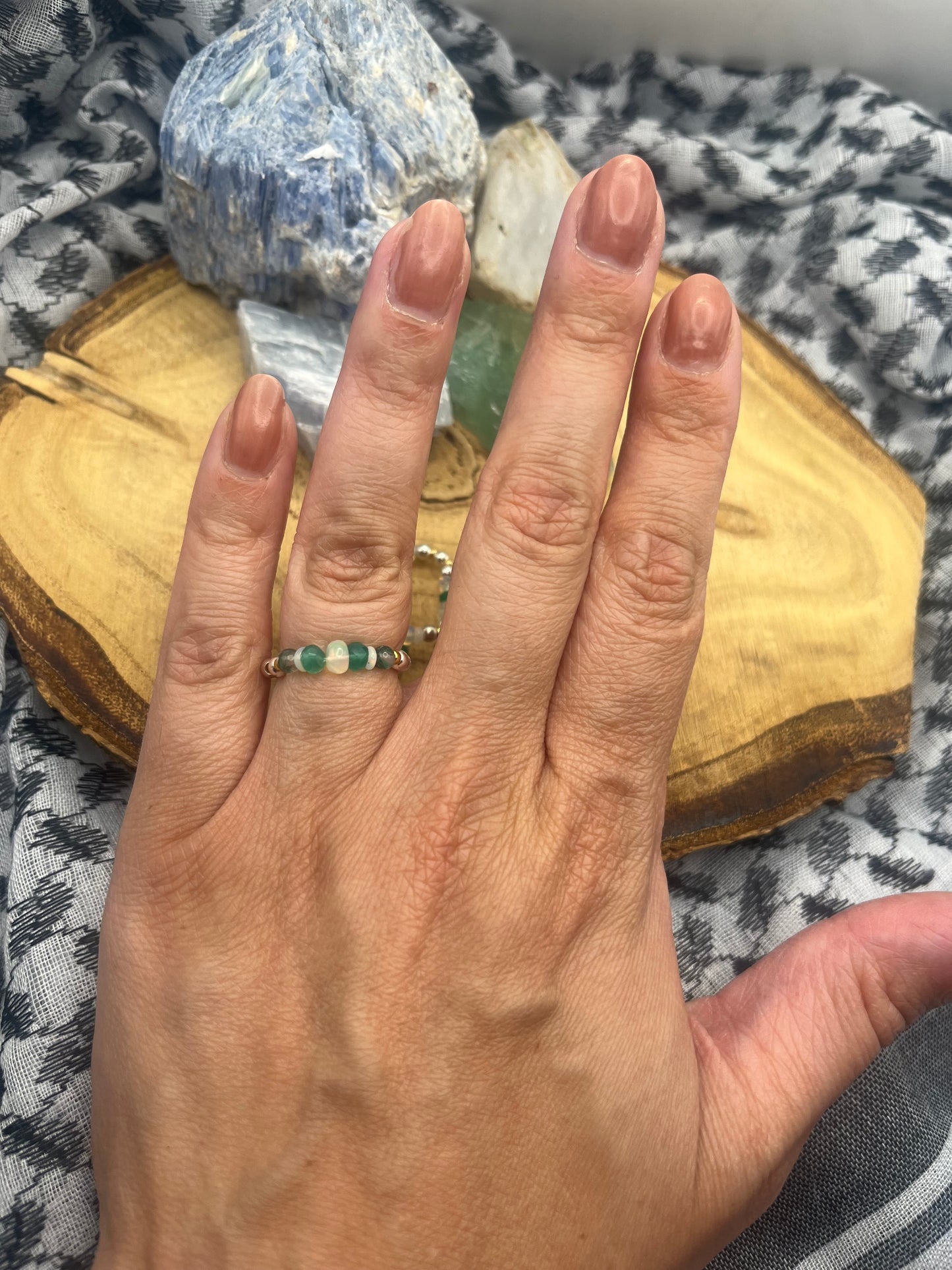 Green onyx, Opal and Moss Agate with gold plated silver and sterling silver. Stretchy Ring available in small, medium and large.
