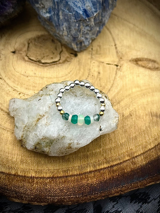 Green onyx, Opal and Moss Agate with gold plated silver and sterling silver. Stretchy Ring available in small, medium and large.