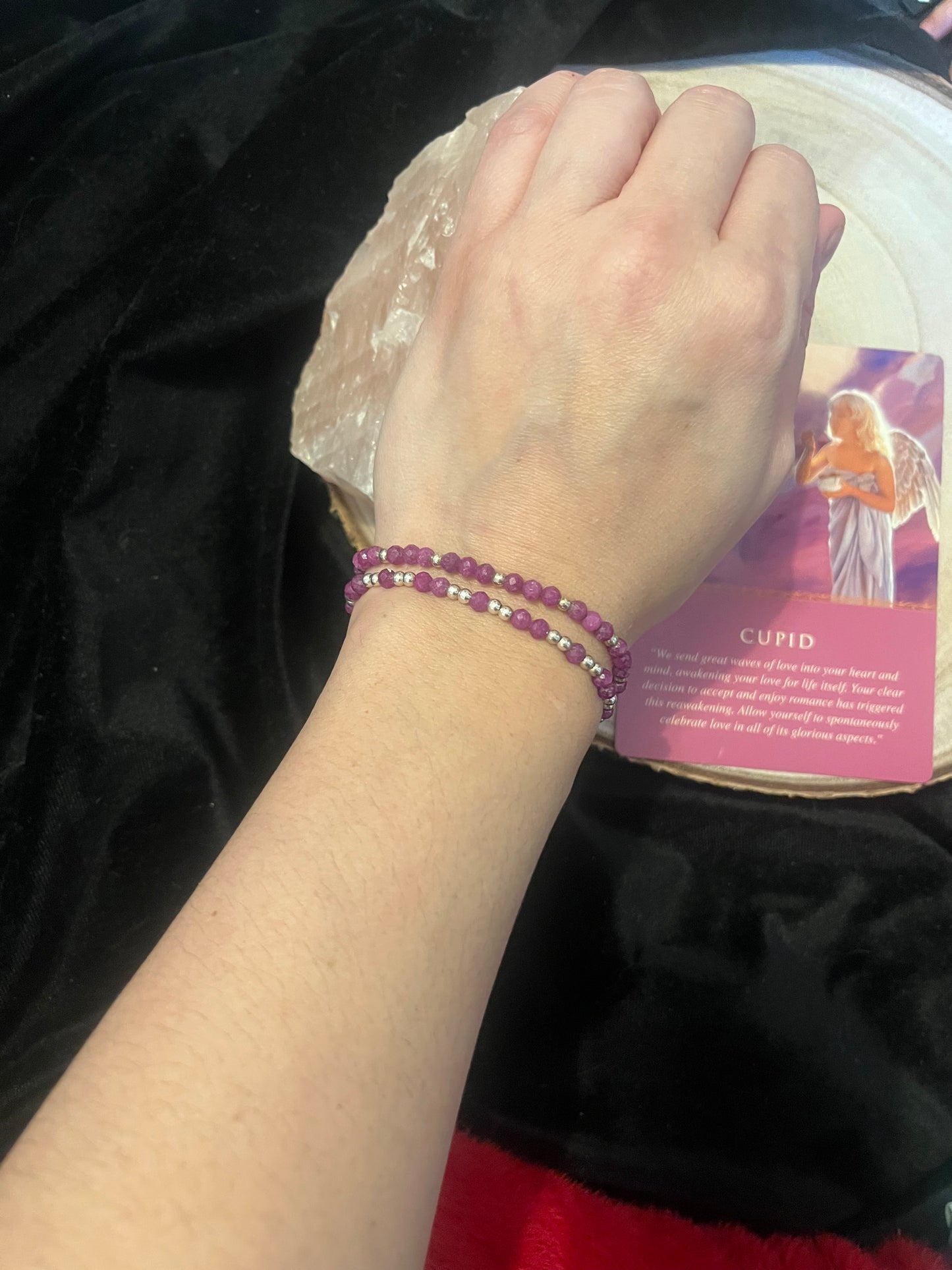 Faceted Ruby and sterling silver stretch bracelet size small.