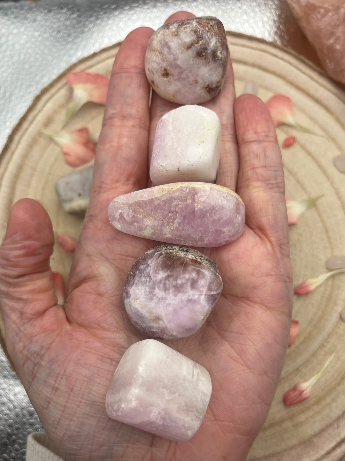 Rare pink aragonite tumblestones. With brown aragonite and white calcite.