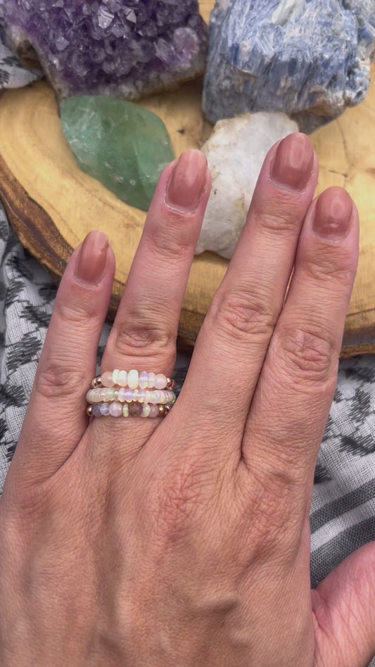 Opal and Sterling silver / gold plated stretch ring.