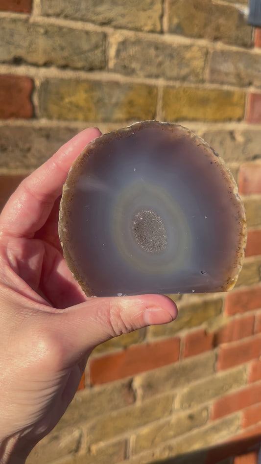Gorgeous natural stand up geode with polished front. 7.2cm