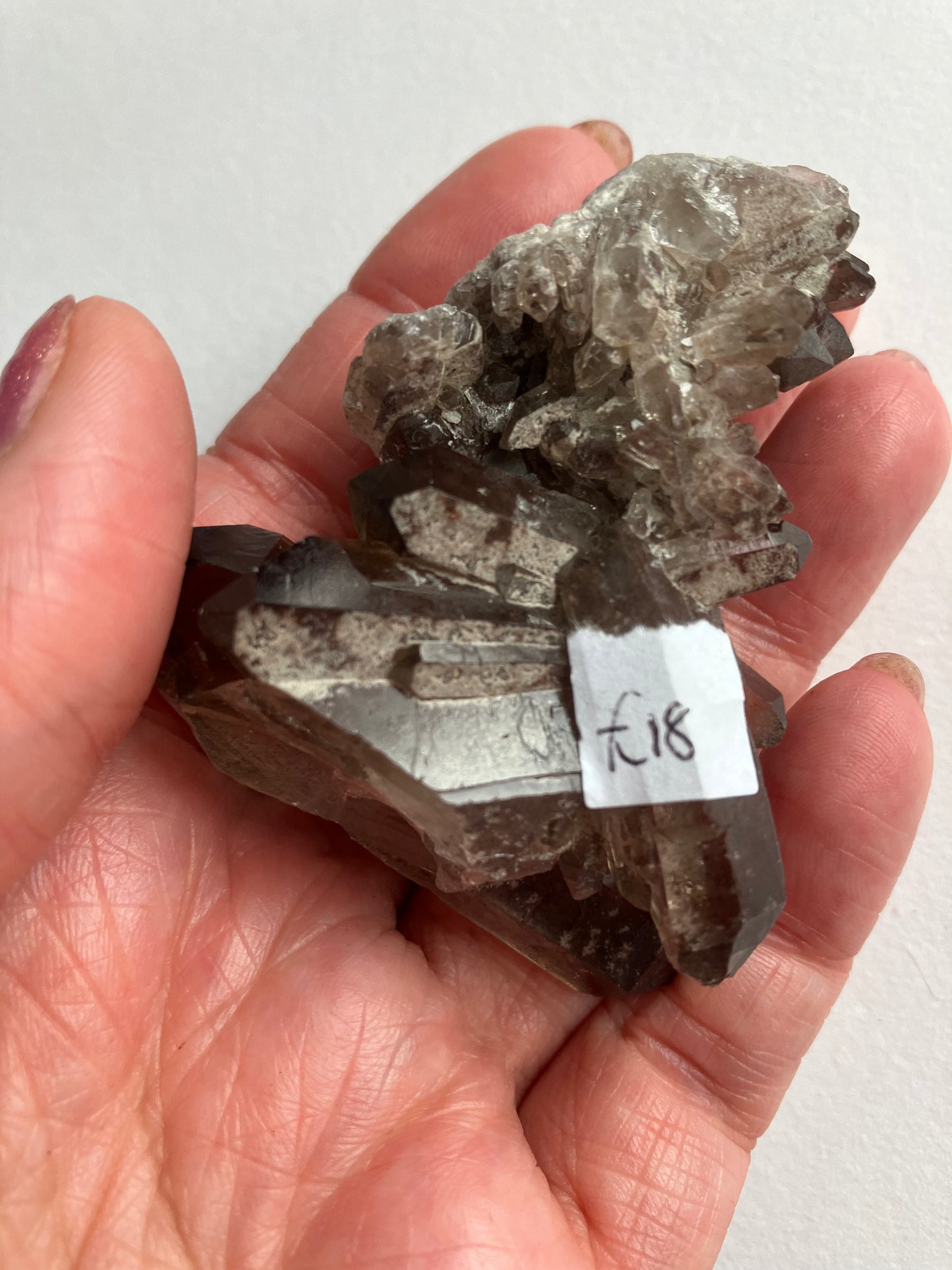 Smoky quartz cluster with lithium inclusions