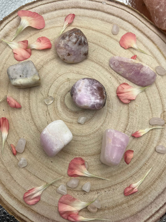 Rare pink aragonite tumblestones. With brown aragonite and white calcite.