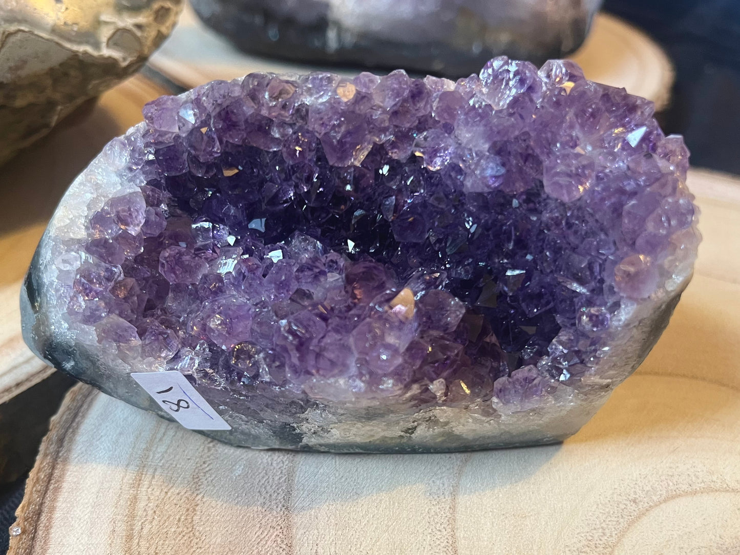 A grade Amethyst cut base. Polished edges.