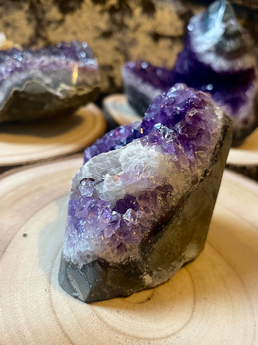 A grade Amethyst cut base with calcite. 660g