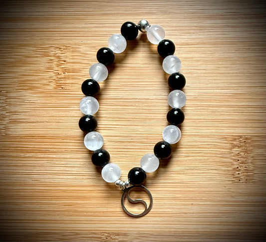 Handmade Yin Yang ☯️ stretch bracelet. 8mm Satin Spar and Tourmaline beads with sterling silver.