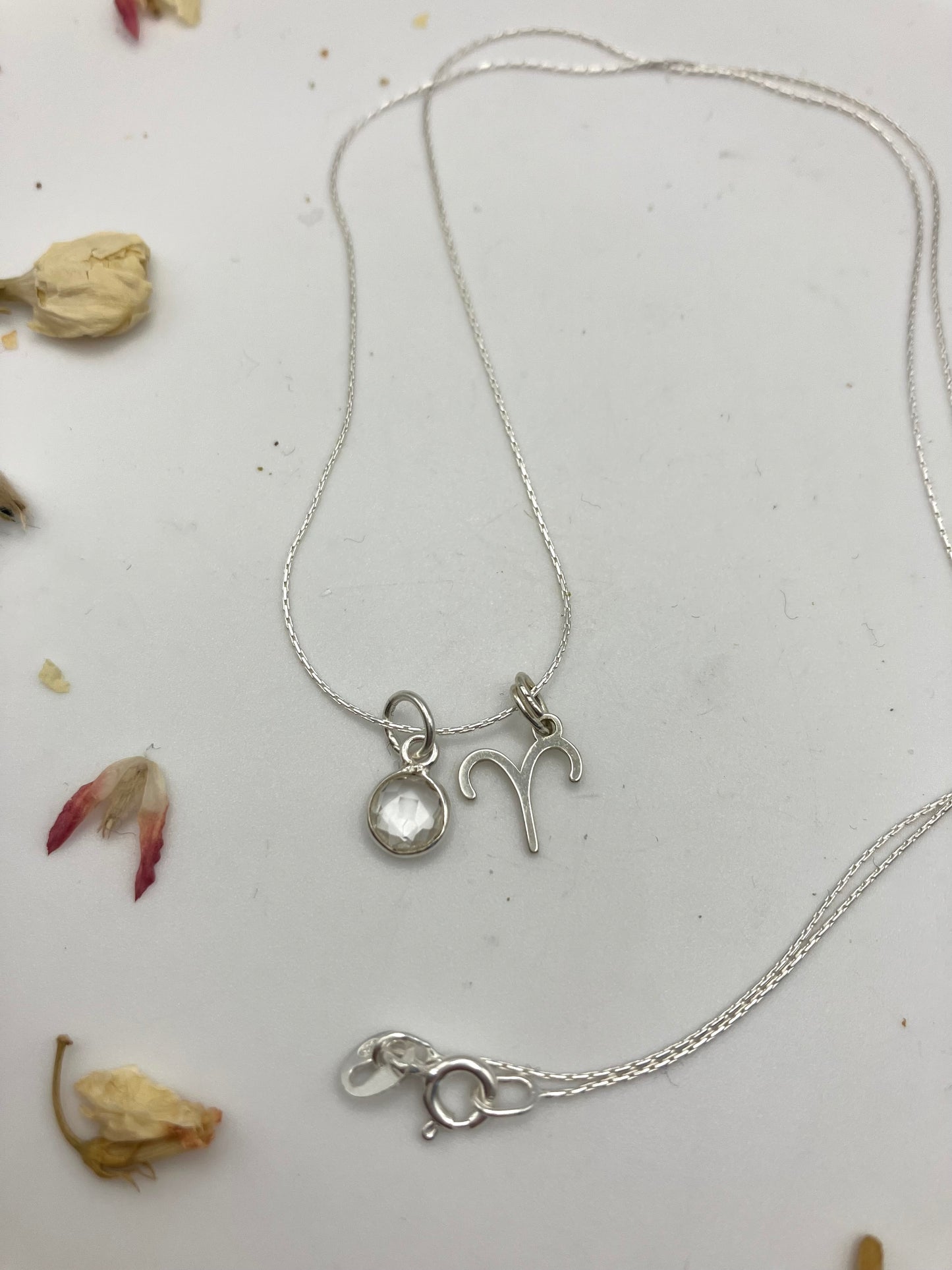 Sterling Silver Aries Necklace with Clear Quartz gem charm.