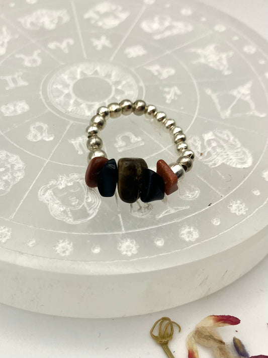 Tigers eye, goldstone and black onyx silver coloured iron beads.