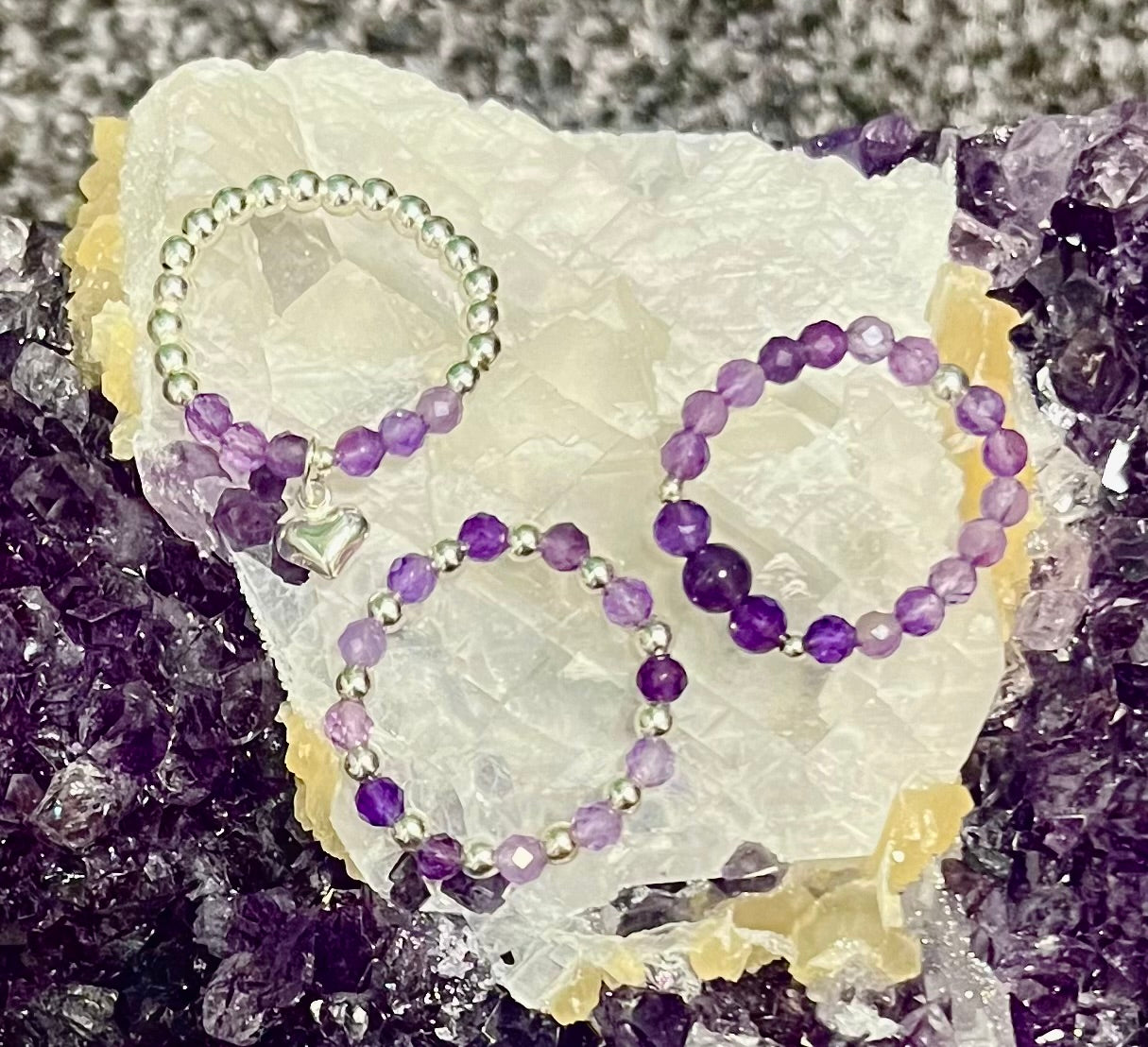 Crystal Dreams - Amethyst Ring stack. Sterling Silver handmade stretchy rings.