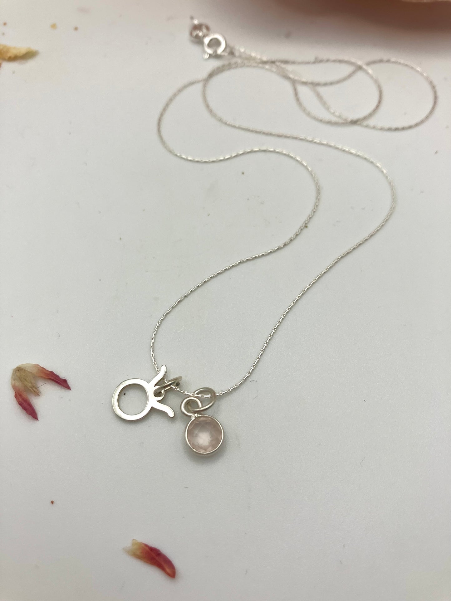 Sterling Silver Taurus Necklace with rose Quartz gem charm.