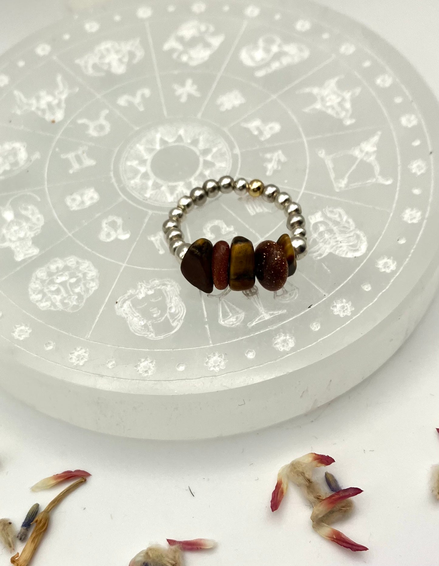 Sacral chakra - goldsone and tigers eye with silver coloured iron beads.