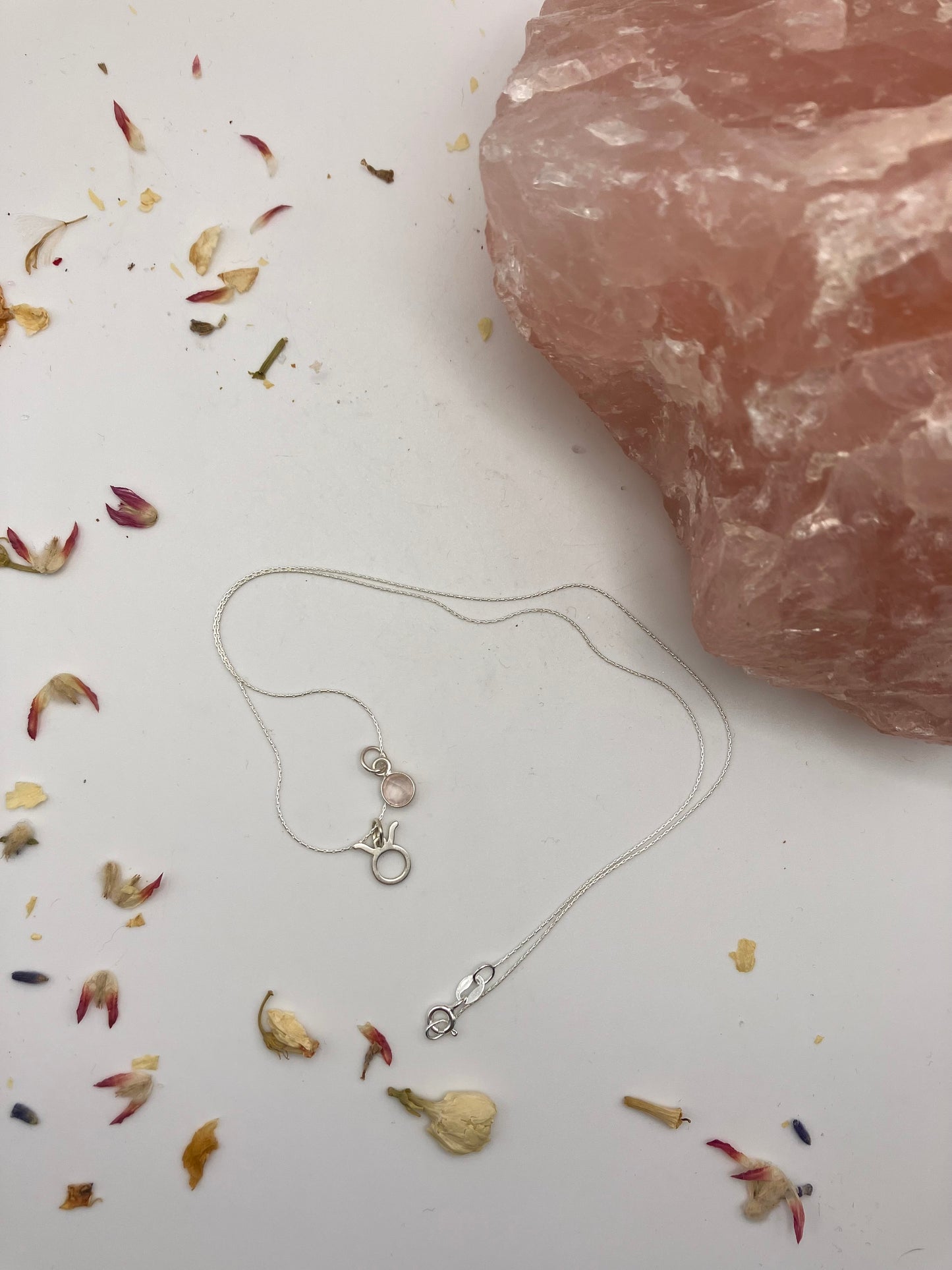 Sterling Silver Taurus Necklace with rose Quartz gem charm.