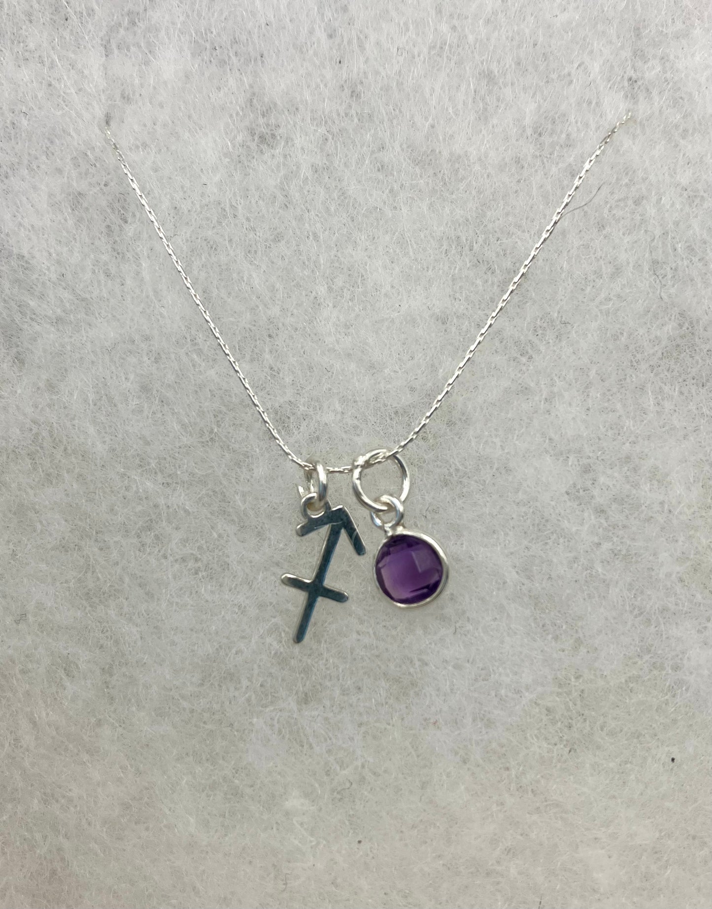 Sterling Silver Sagittarius Necklace with Amethyst gem charm.