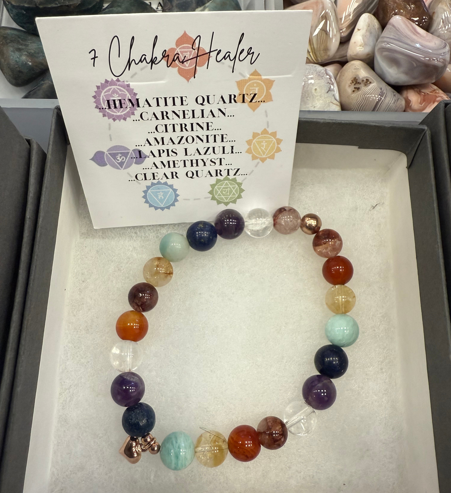 Handmade 7 Chakra stretch bracelet. 8mm Premium Crystal beads with sterling silver.