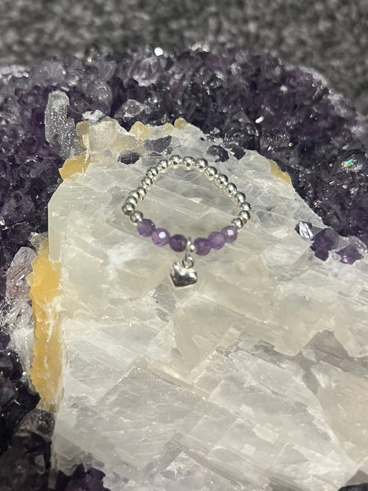 Crystal Dreams - Amethyst and heart charm ring. Sterling Silver handmade stretchy rings.