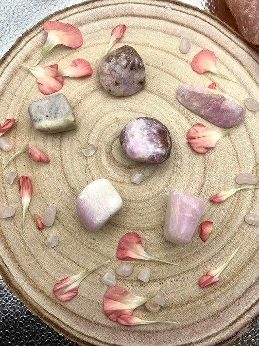 Rare pink aragonite tumblestones. With brown aragonite and white calcite.