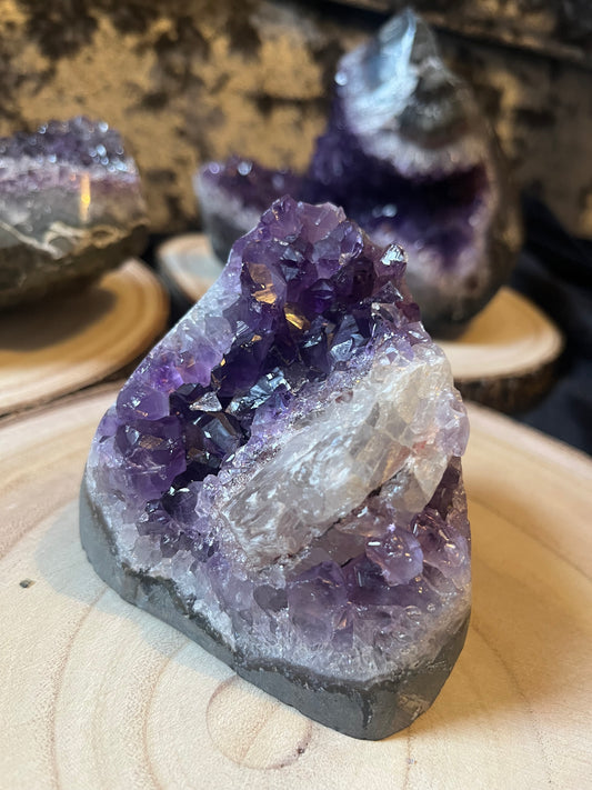 A grade Amethyst cut base with calcite. 660g