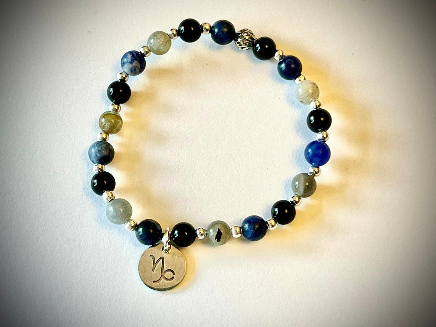 Capricorn charm birthstone bracelet. TWO OPTIONS. Labradorite, Sodalite, Black onyx. Zodiac birthday gift. Calming, grounding, thoughtful