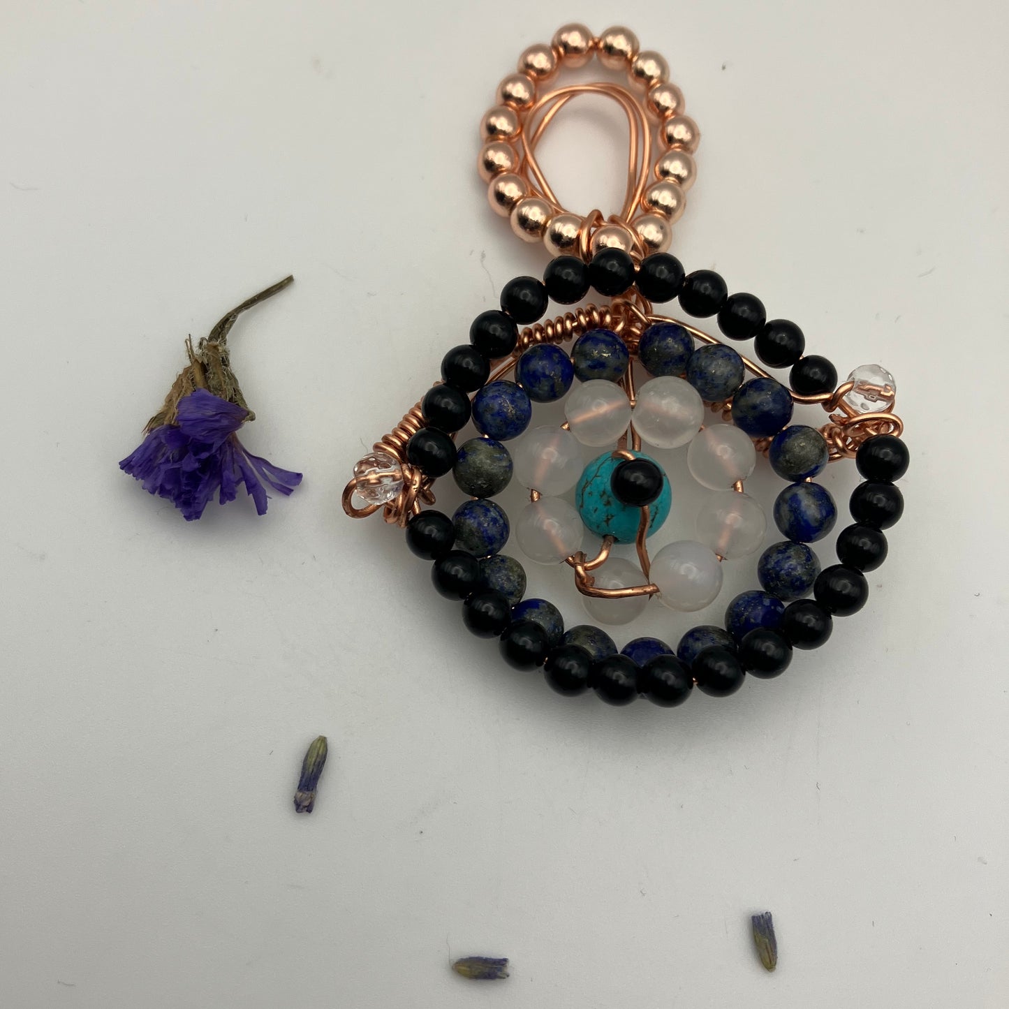 Copper Wire wrapped and beaded ‘Evil eye’ pendant. Black Onyx, Turquoise, Lapis Lazuli and Selenite