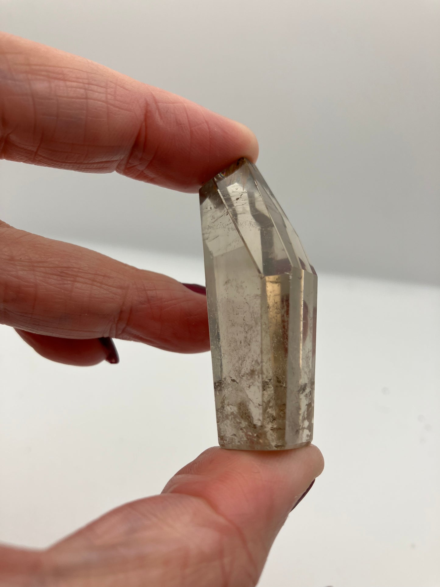 Smoky Quartz Freeform with little golden rutile inclusion at tip.