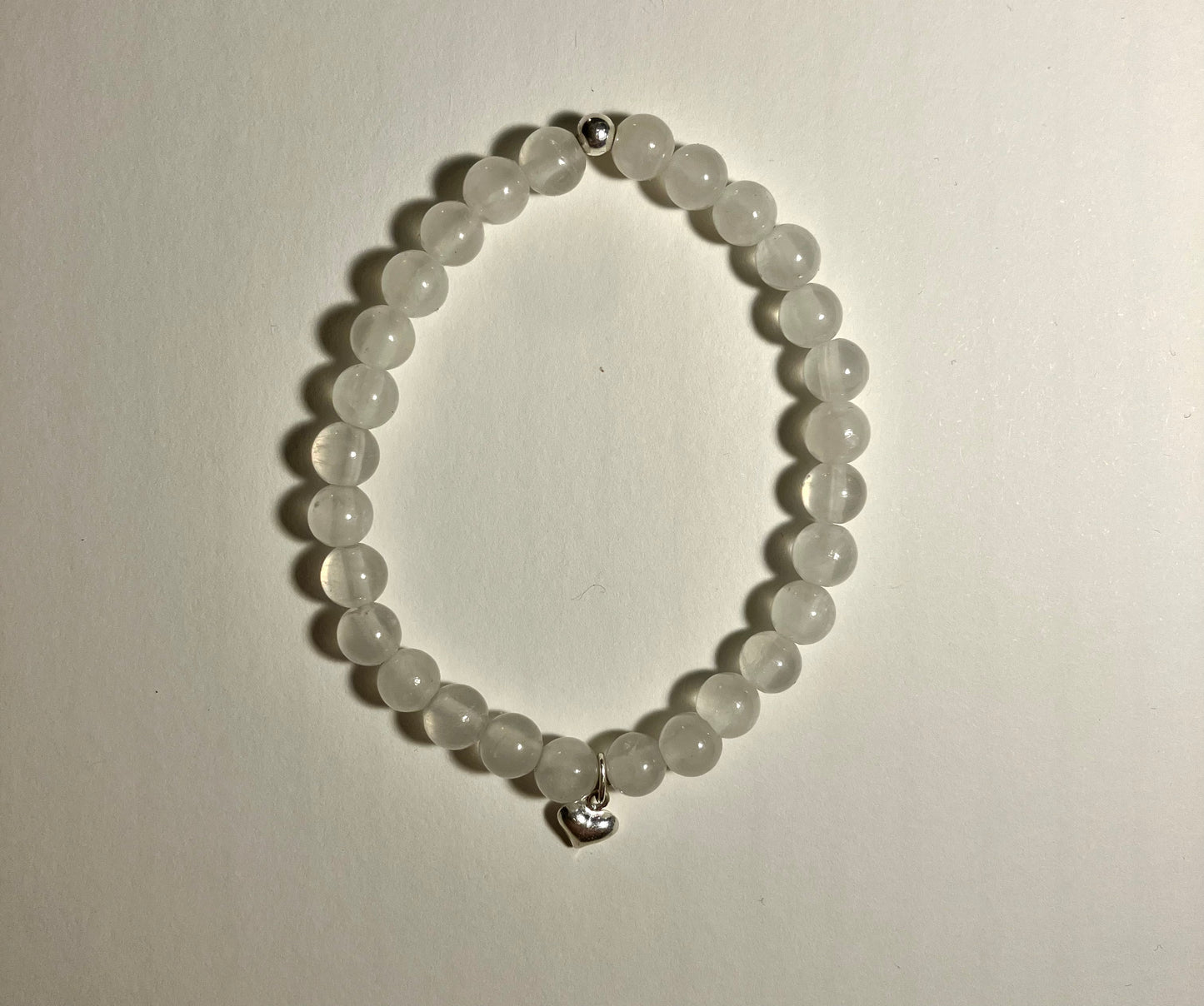 Selenite cleansing crystal bracelet. Bringing purity and light. 925 sterling silver and real gemstone beads.