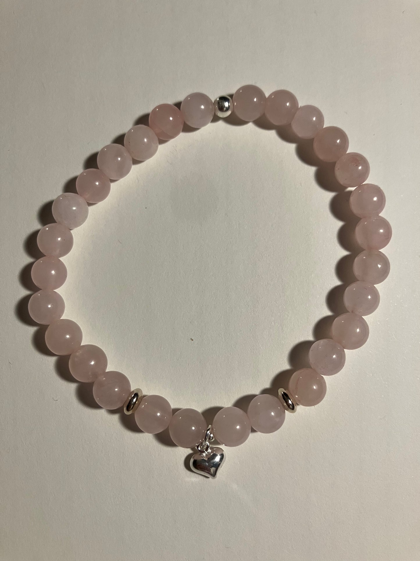 Crystal heart chakra healing bracelet. Rose Quartz. 925 sterling silver and real gemstone beads.