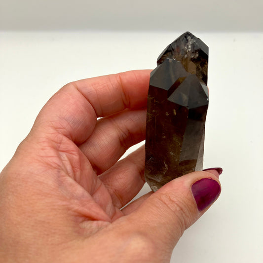 Very dark, natural Smoky Quartz triple . Weight tbc